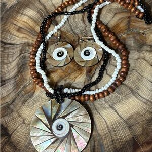 Elegant Spiral Shell Jewelry Set - Necklace and Earrings